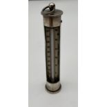 A London silver pocket thermometer. produced by. Negretti & Zambra London. [11cm in height]