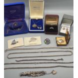 A Collection of silver jewellery to include brooches, ring with sapphire and clear stones, silver