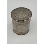 An Indian silver engraved preserve pot. [128grams] [8.5cm in height]