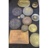 A Quantity of Middle east and Tibetan copper and brass wall plaques, trays and bowls.