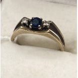 A Ladies 9ct gold diamond and sapphire ring. [Ring size Q] [2.91grams]