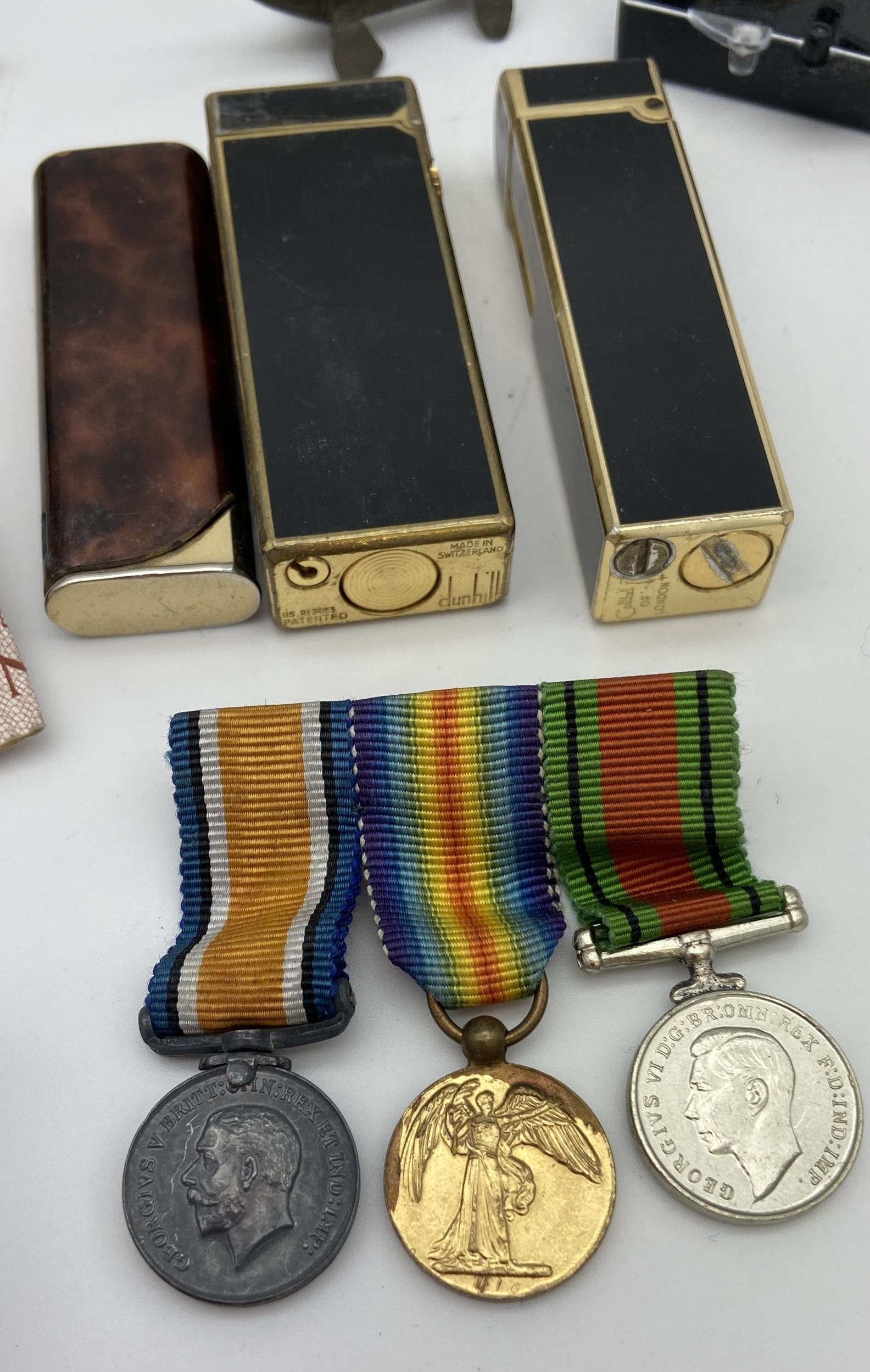 A Collection of mixed coins, lighters and medals etc - Image 2 of 7