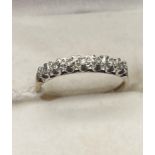 A 9ct gold and diamond ladies ring. [Ring size O] [1.29Grams]