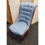 19th century parlour chair with arched blue button-upholstered back and cushioned seat, raised on