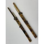 Two 19th century Japanese Knife and chopstick sets in tortoise shell casing.