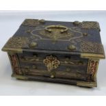 Antique Indian Chest designed with heavy brass bounds and inlays, Comes with a key and mechanism for