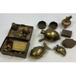 A Selection of Middle east antiques to include hand held heart shaped pipes, slave bangles,