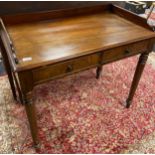 A 19th century two drawer writing desk. Supported on turned legs. [82x94x55cm]