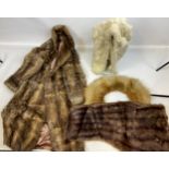 A Collection of fur coats and shawls