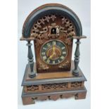An Antique Black Forest Cuckoo Mantel clock, Fitted with double bellow cuckoo mechanism, [Runs for a