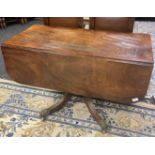 Georgian mahogany table with drop leaf sides above a single frieze drawer to one end and opposing