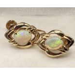 A Pair of 14ct gold and opal earrings. [4.39grams]