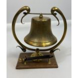 An Art Nouveau design brass dinner gong bell [23cm in height]