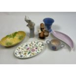 A Selection of porcelain items to include hummel girl figure, Lladro figure, Poole pottery sugar