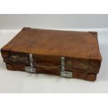 A Vintage Revelation leather bound travel case.
