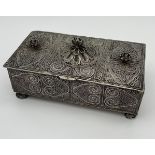 An Indian silver filigree design trinket box. [504grams] [8x17.5x9.5grams]