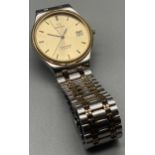 A Gent's Vintage Omega Seamaster Quartz watch, two tone strap, in a working condition, Serviced 27.