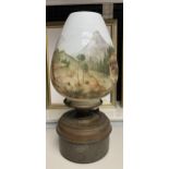 A Large antique paraffin lamp designed with a hand painted glass shade. [shade has a hairline crack]