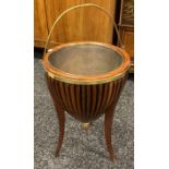 Antique mahogany barrel plant stand supported on three legs and brass liner. [54cm in height]