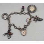 A Birmingham silver charm bracelet and silver charms.