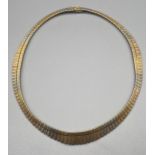 An 18ct gold ornate evening necklace. [37.79grams]