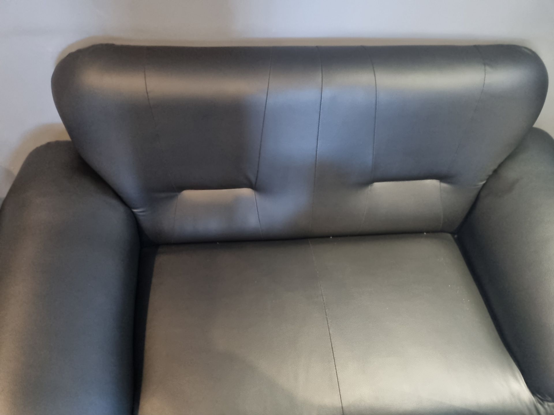 1 x 2 seater Black Leather Sofa