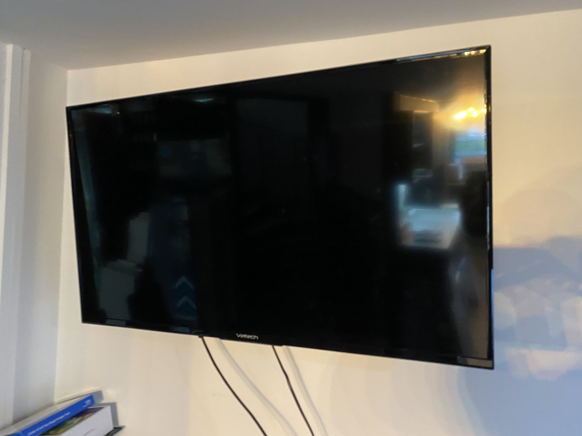 Large V-Tech flat screen Television
