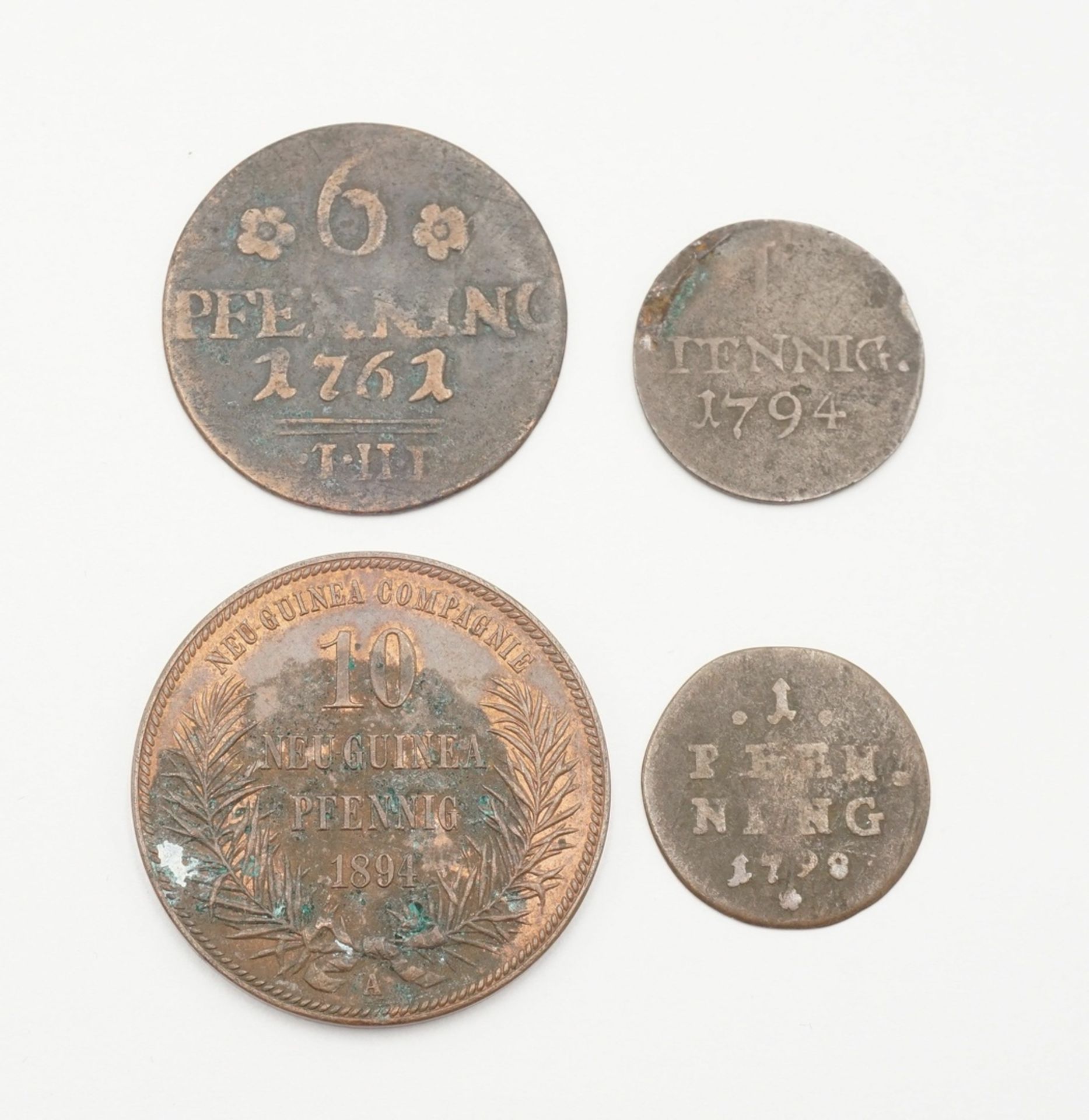 Neuguinea Pfennig 1894 und drei Münzen aus dem 18. Jh.