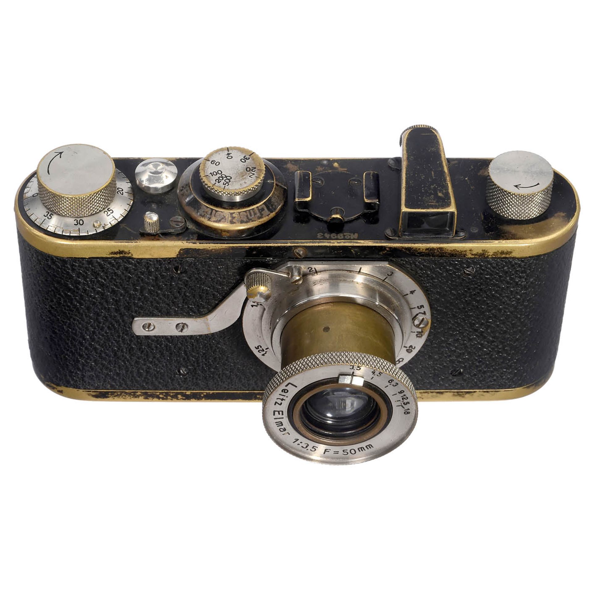 Leica I (Modell A), um 1928 Leitz, Wetzlar. Nr. 9943, mit Elmar 3,5/50 mm. Pilzförmiger Auslöser mit