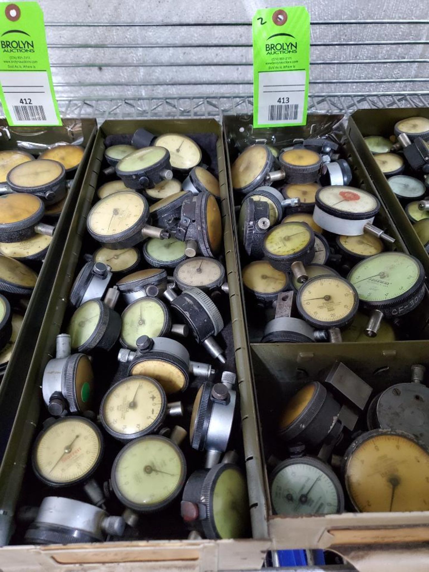 Large assortment of dial indicators.