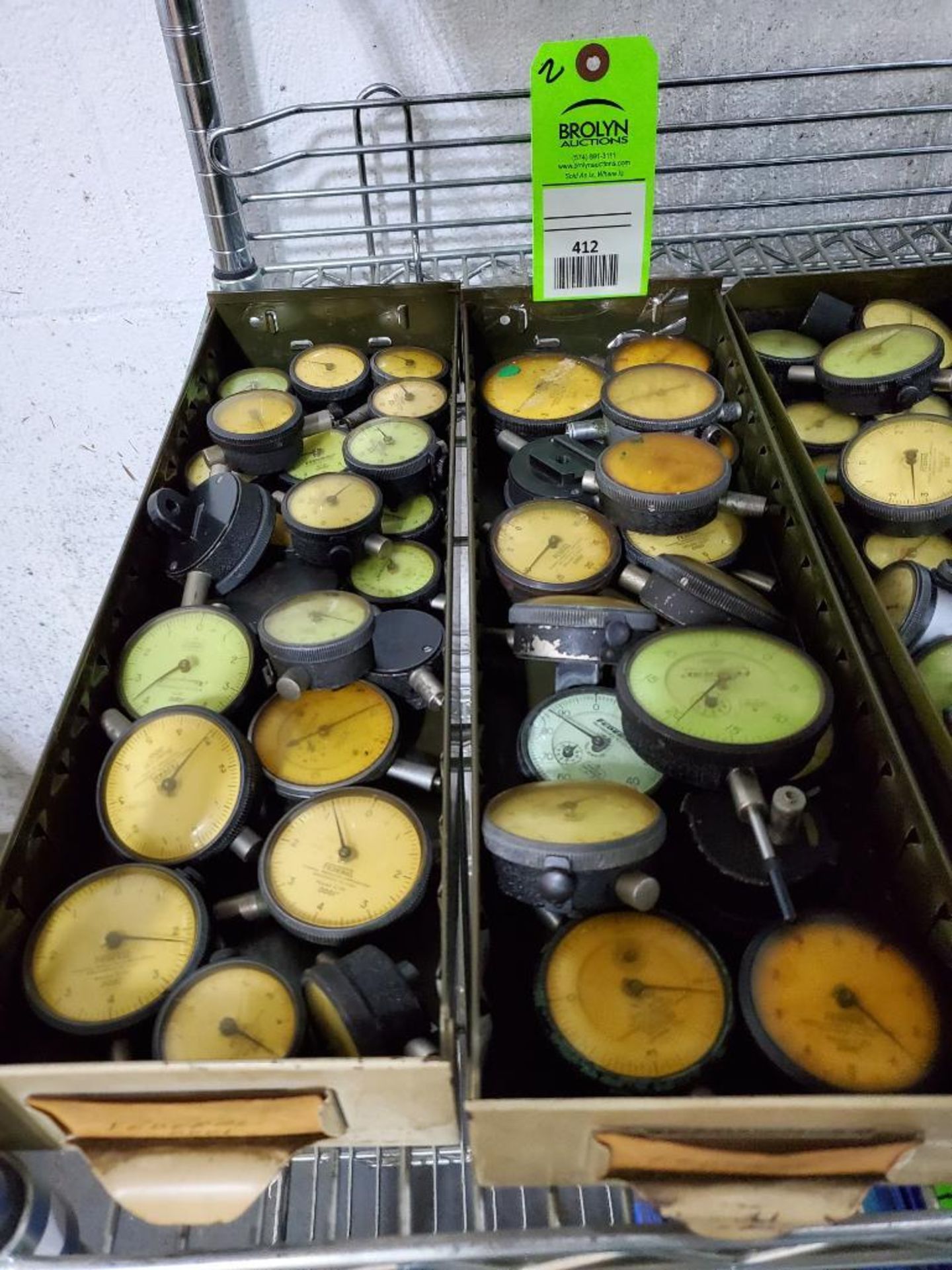 Large assortment of dial indicators.