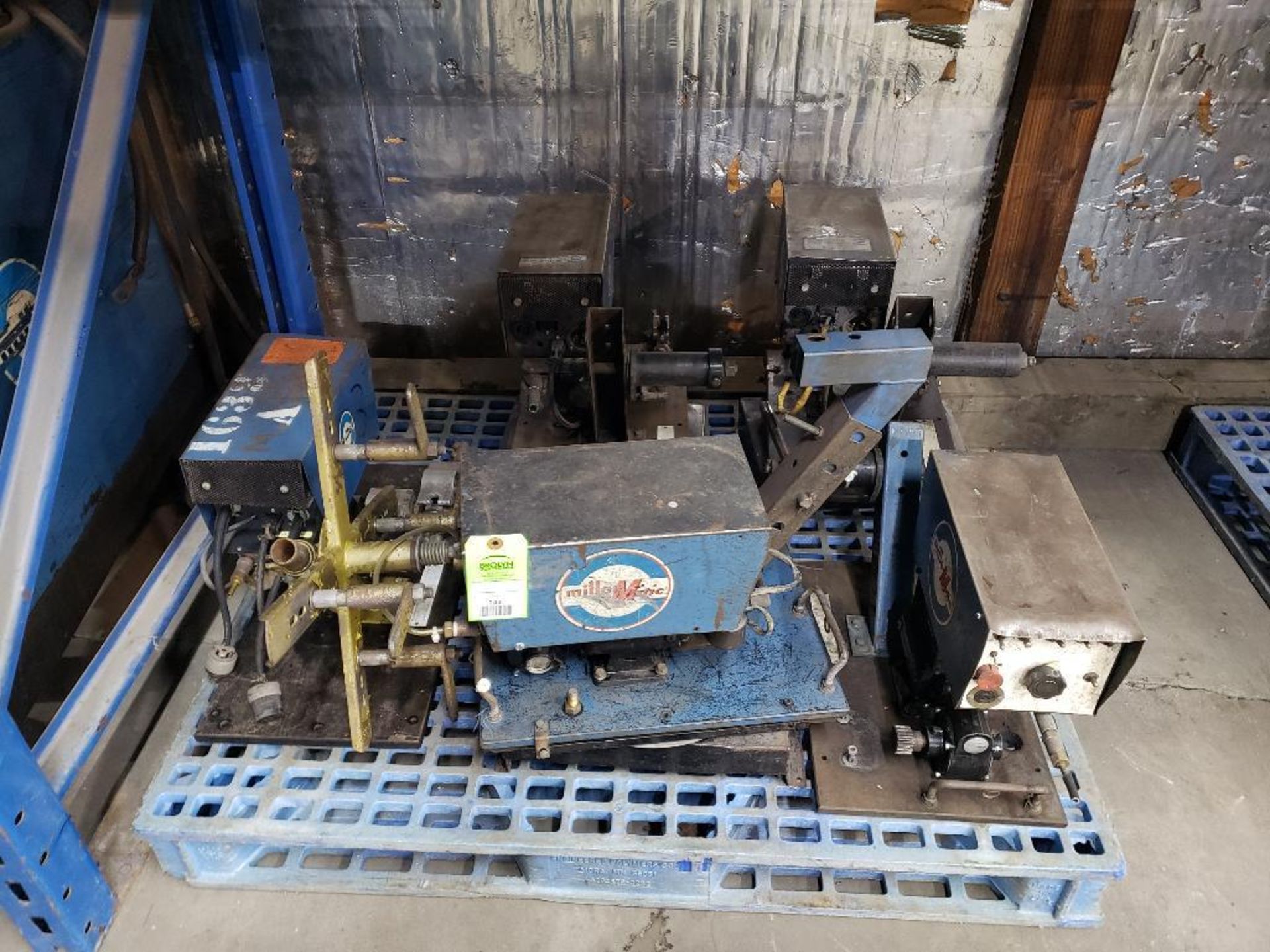 Pallet of assorted Miller wire feeders.