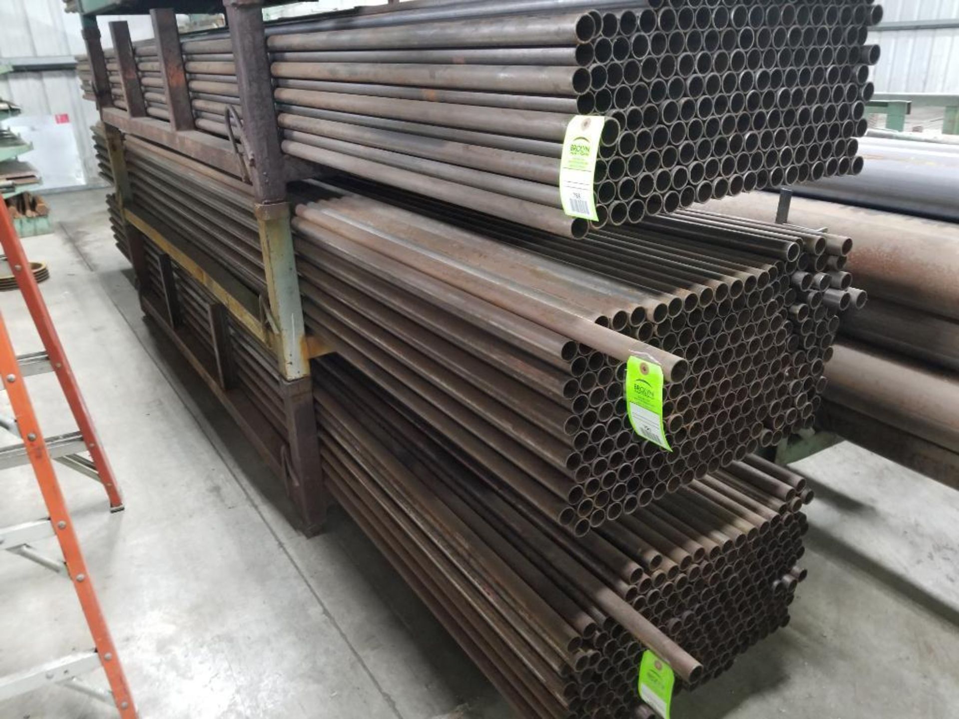 Large qty of steel tube stock as pictured in one section.