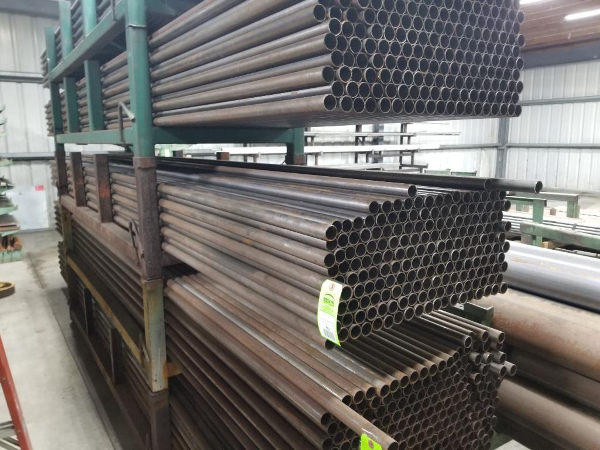 Large qty of steel tube stock as pictured in one section.