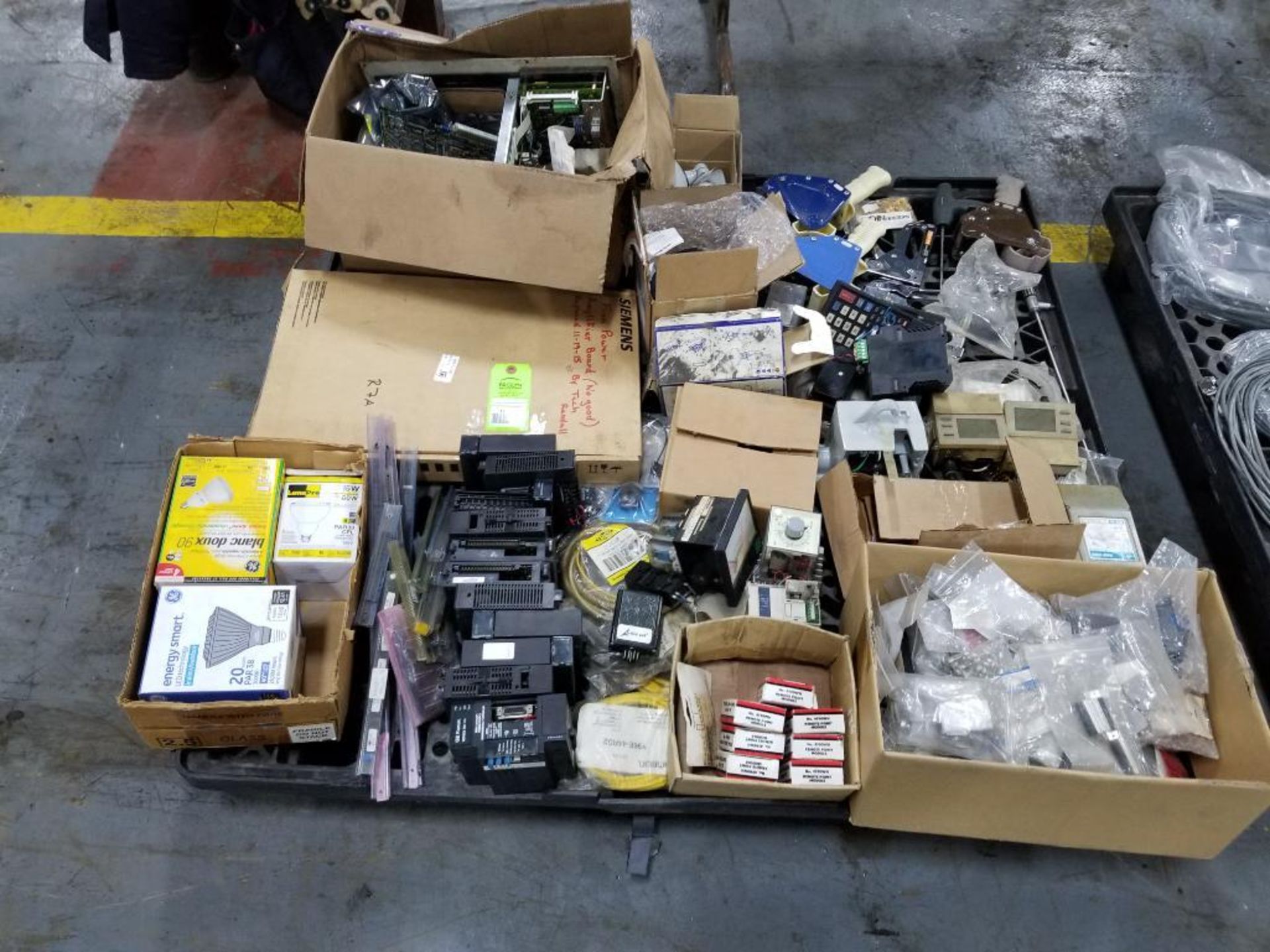 Pallet of assortet electrical and parts.