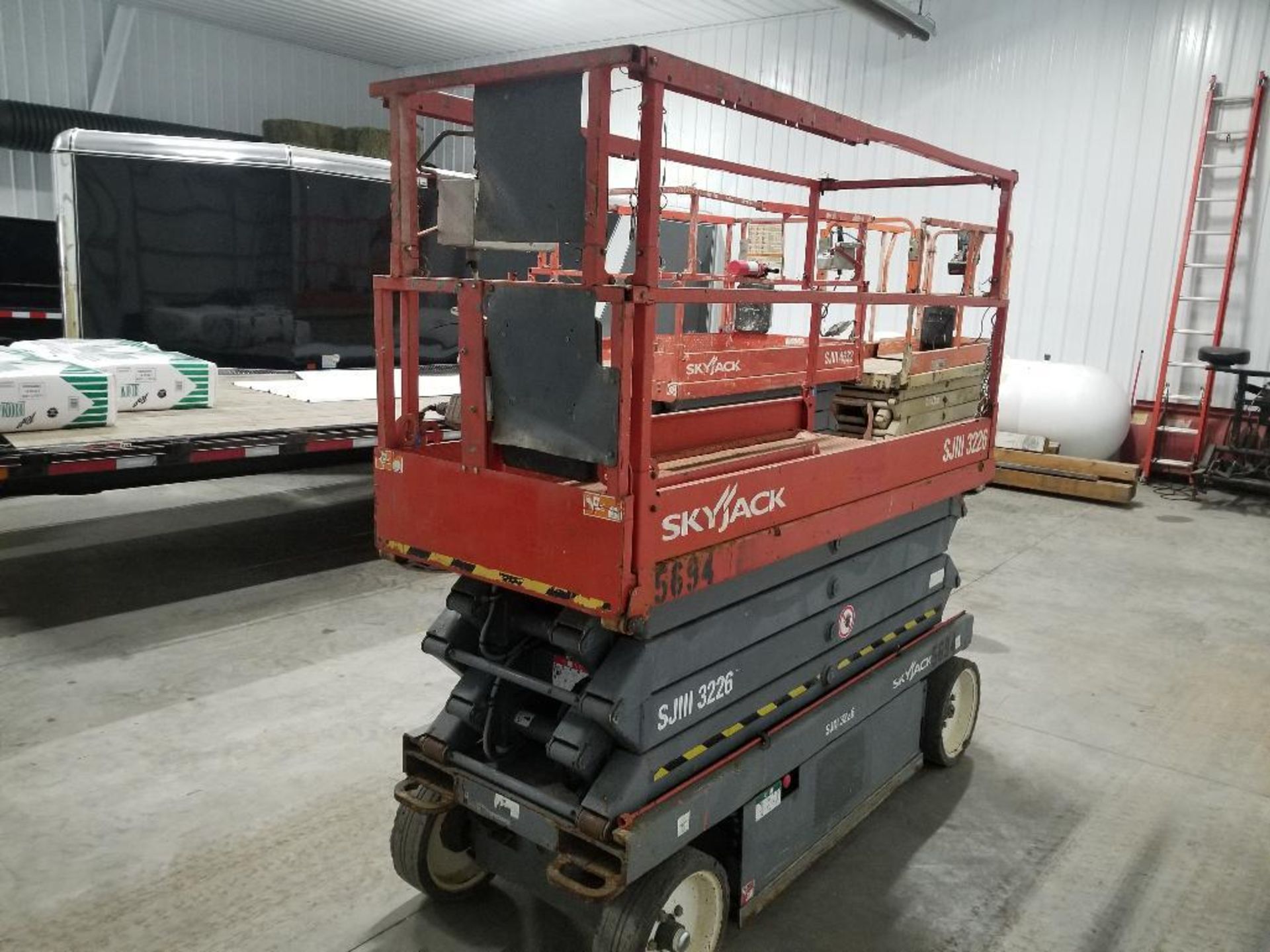 26' SkyJack scissor lift. Model SJIII 3626. Serial number 27015864.