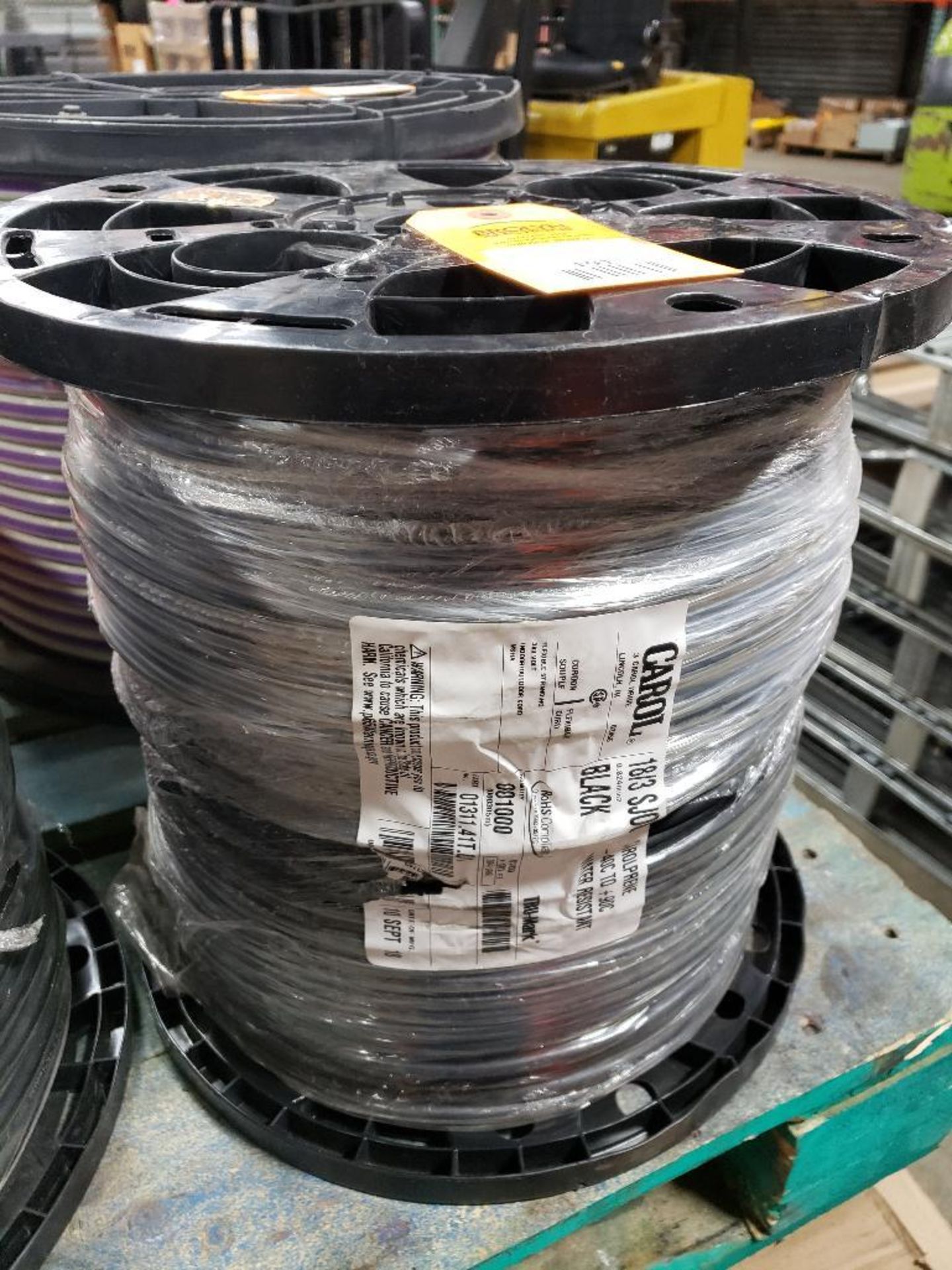 1000' Carol Electric wire. 18/3 SJ00W. New on spool.