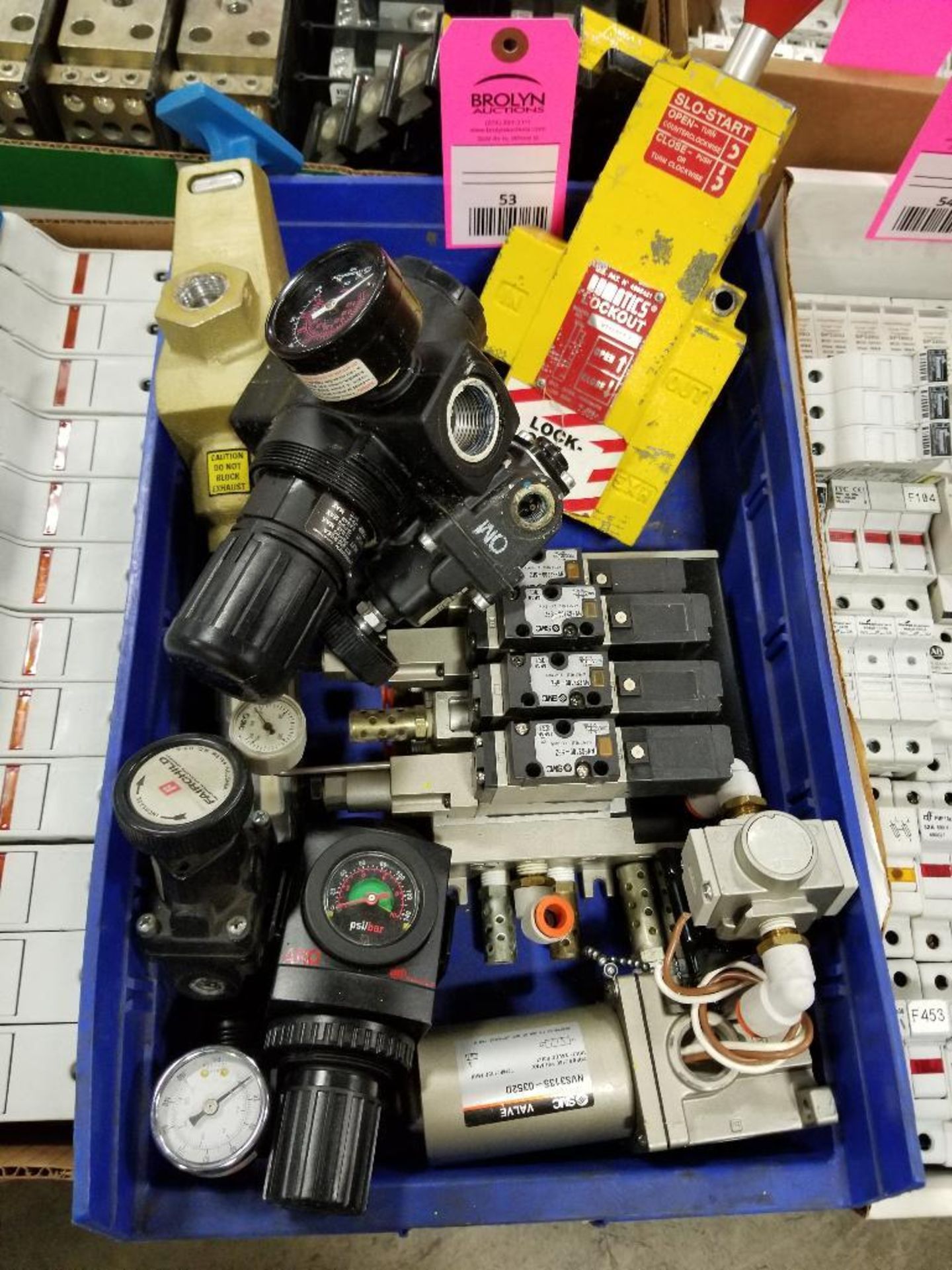 Large assortment of pneumatic valves and regulators.