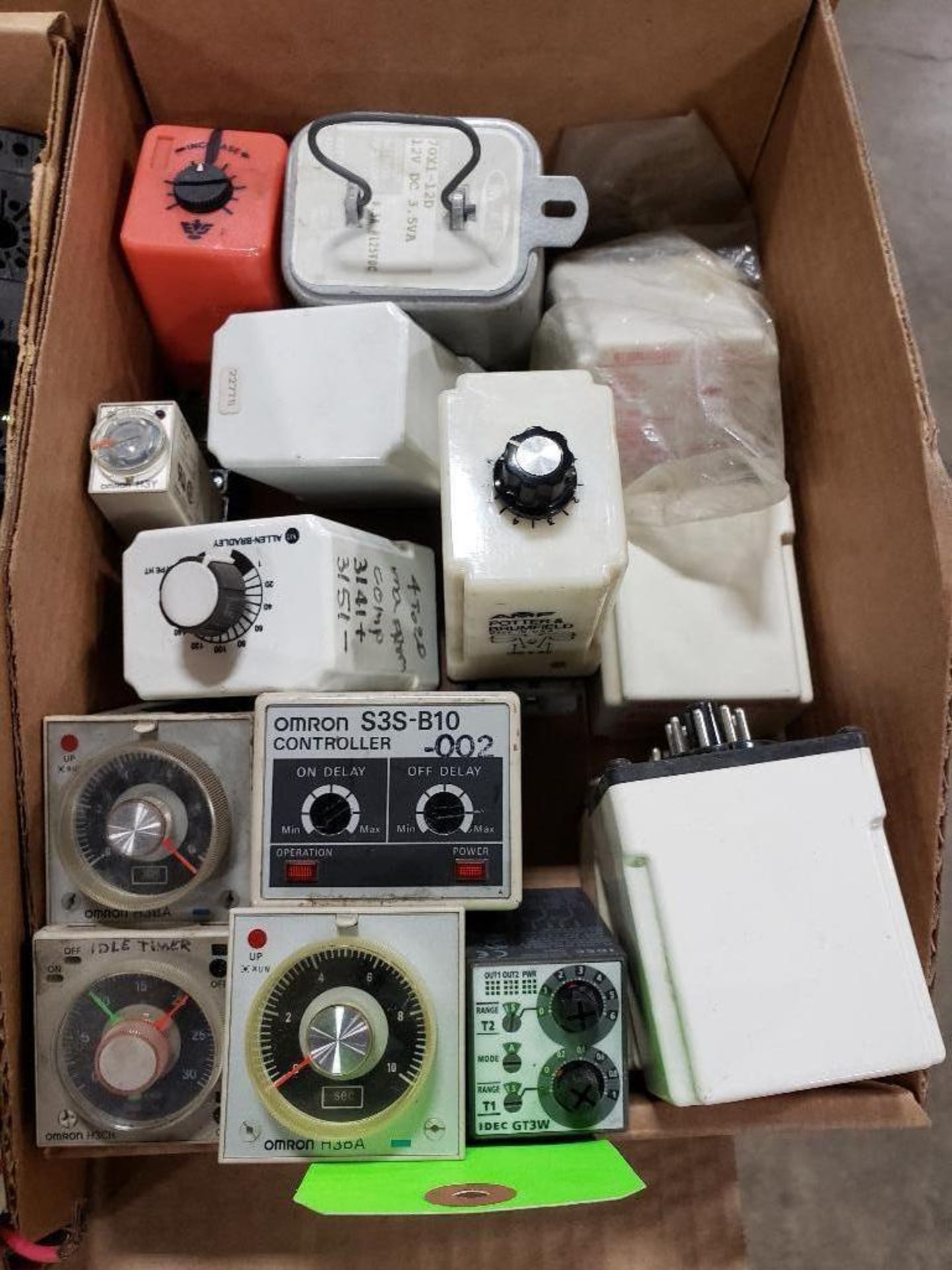 Assorted electrical timers and relays. Omron, IDEC, Potter & Brumfield.