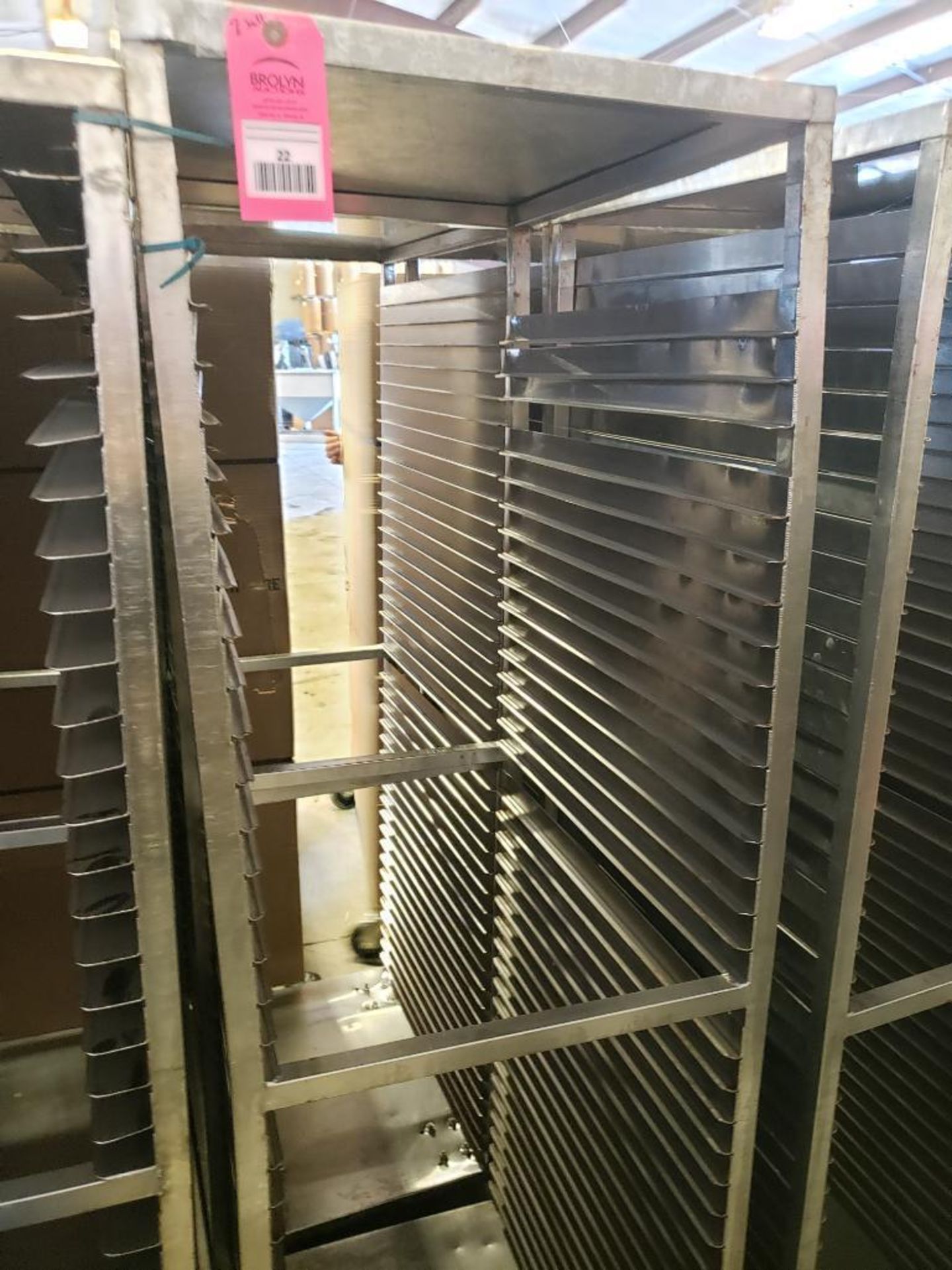 Qty 2 - baking pan rolling rack. 20"W x 72"H x 27"D.