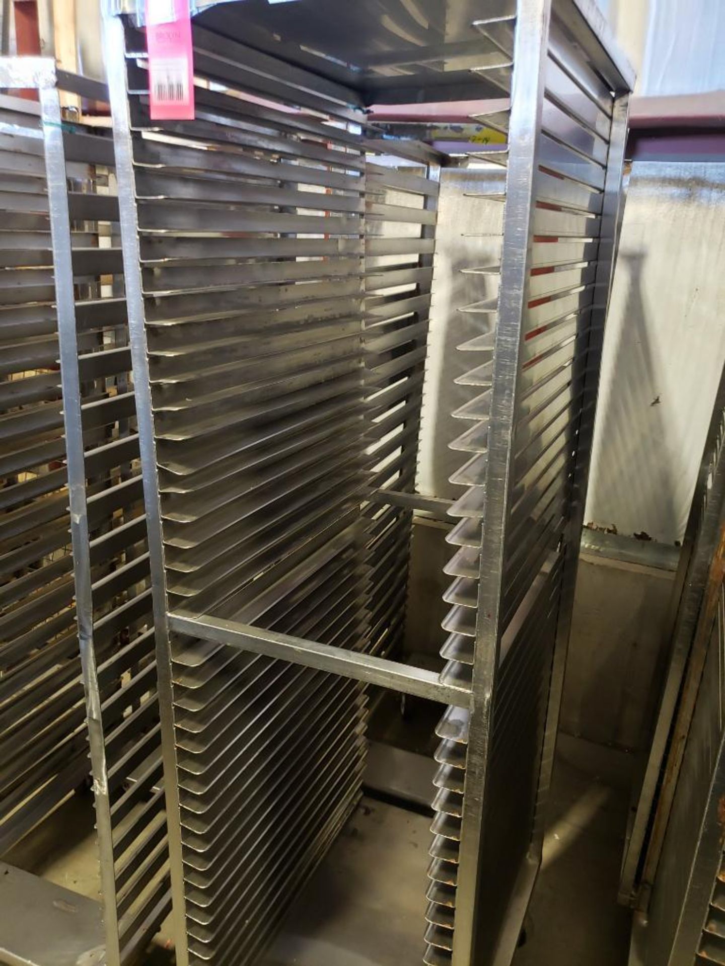 Qty 2 - baking pan rolling rack. 21"Wx68"Hx26"D, 20"Wx72"Hx27"D.