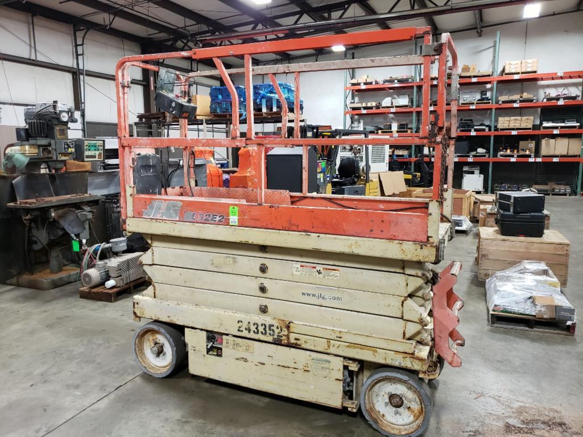 JLG Industries 2632E2 electric scissor lift. 26' lift 32" wide. YR 2003. Serial number 0200II2300.