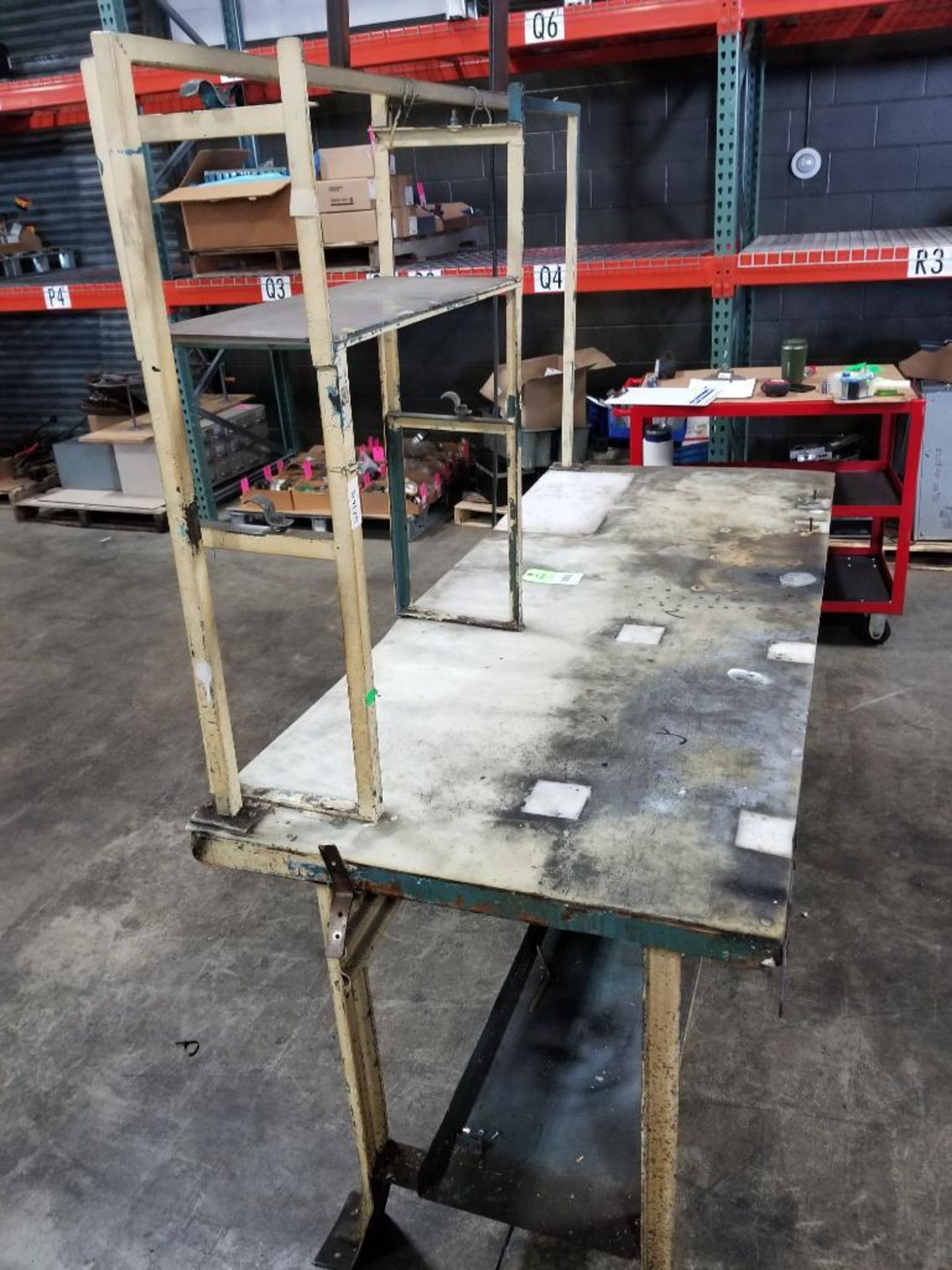 Industrial work table with forward shelf and light fixture. 76x30x90. LxWxH. Wood top under plastic. - Image 7 of 10