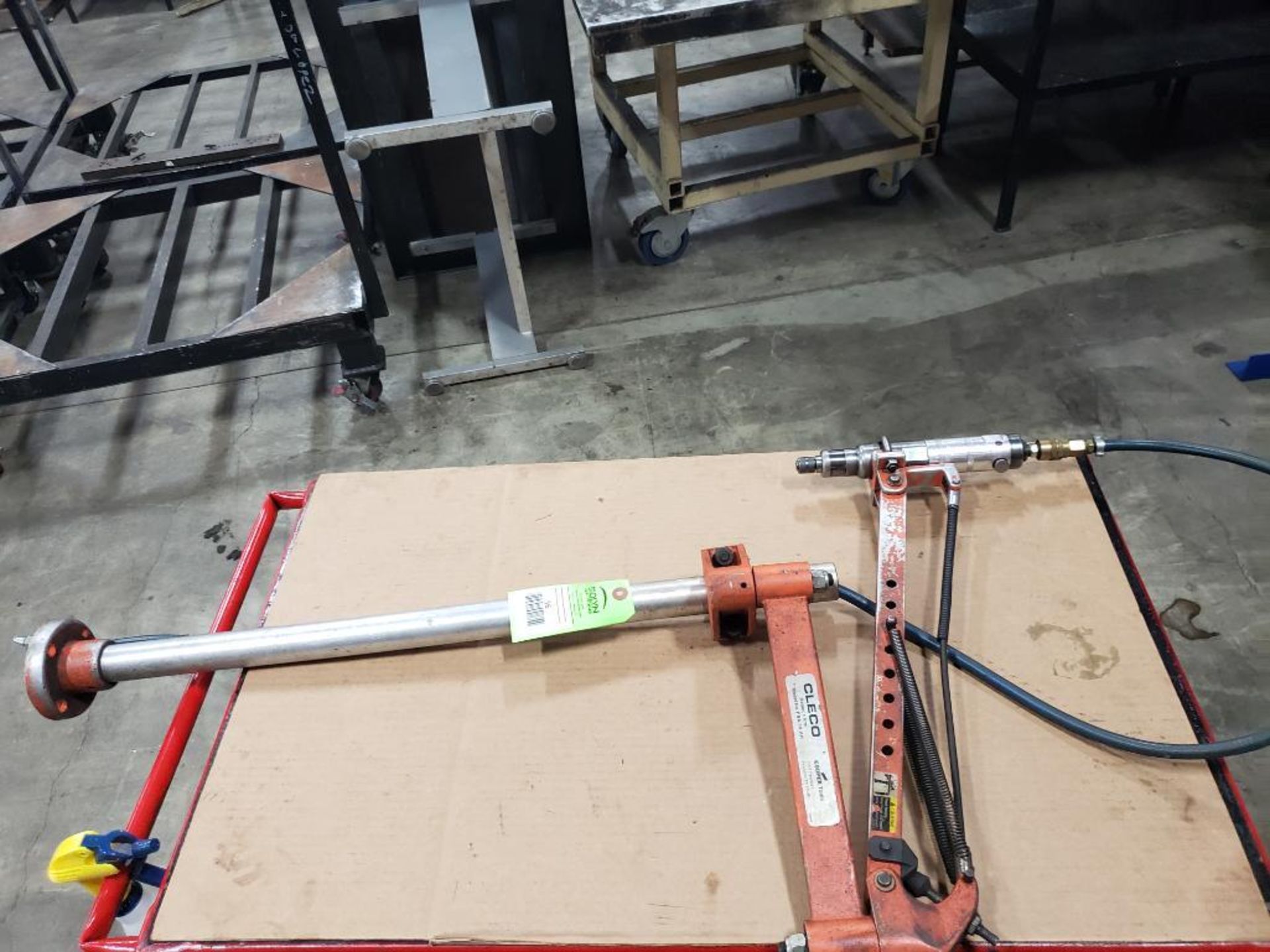 Tool balancer fixture. Cooper Cleco PBA-18-AH Balance arm. Air tool drill attached.