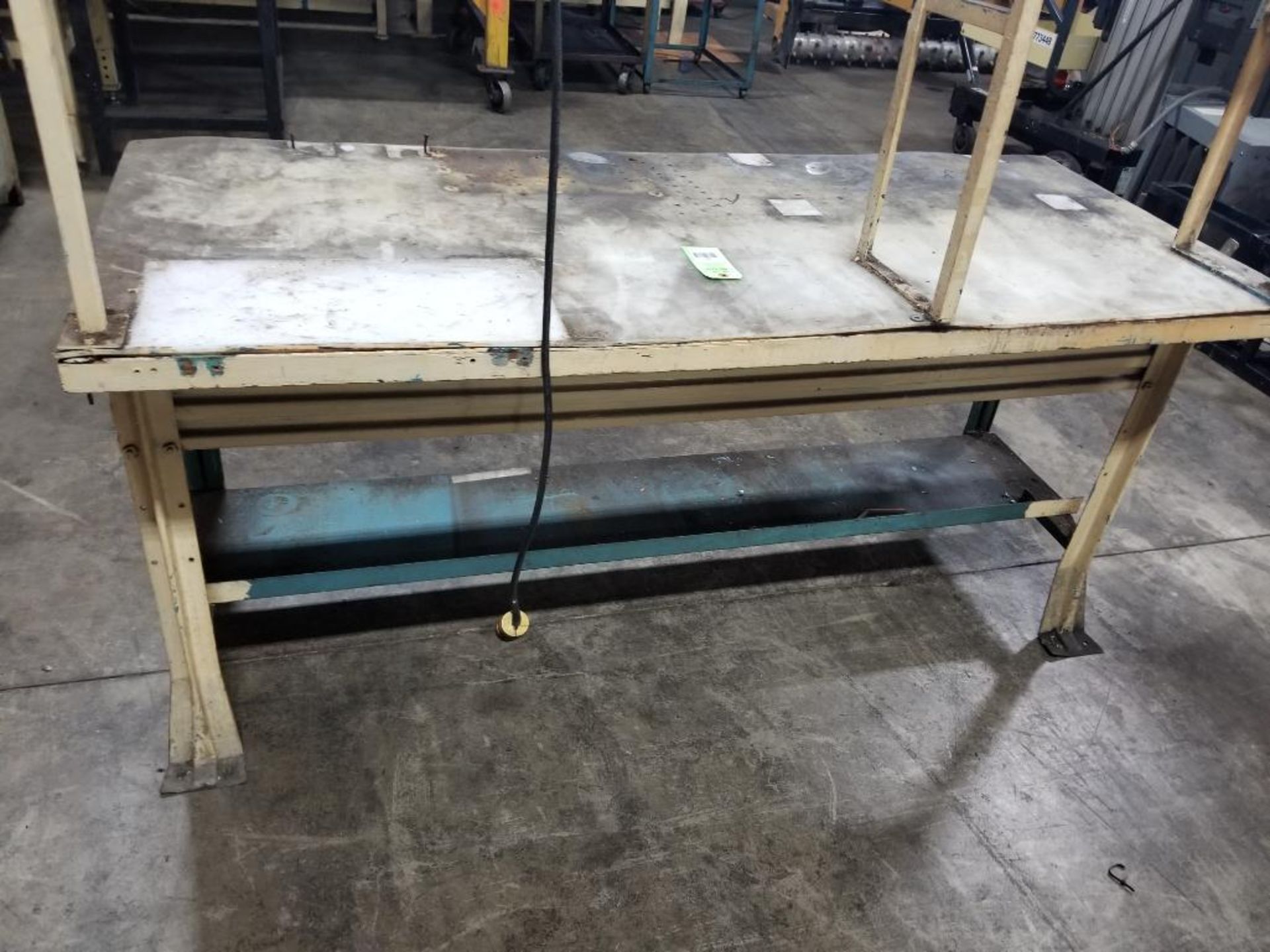 Industrial work table with forward shelf and light fixture. 76x30x90. LxWxH. Wood top under plastic. - Image 10 of 10