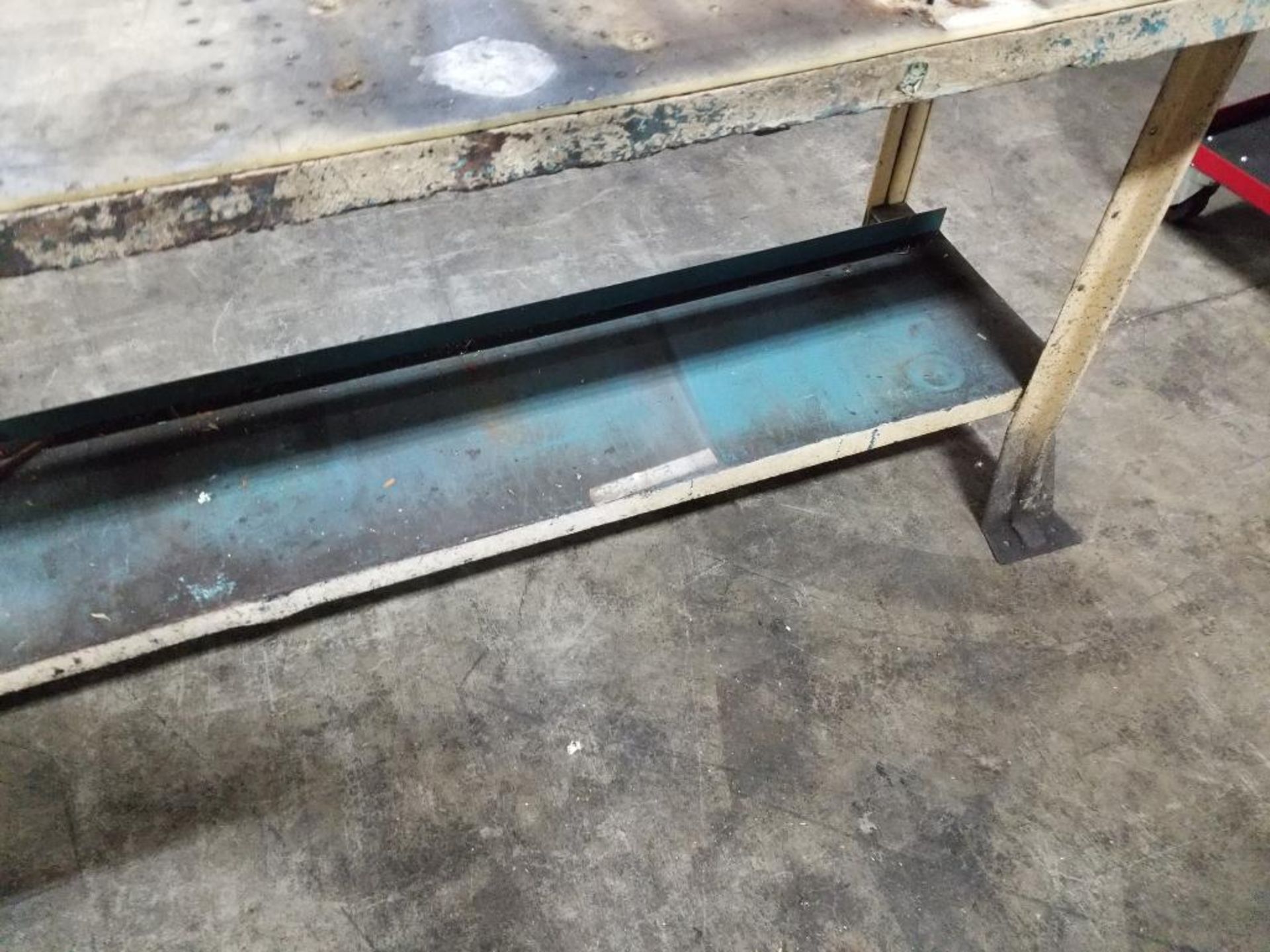 Industrial work table with forward shelf and light fixture. 76x30x90. LxWxH. Wood top under plastic. - Image 3 of 10