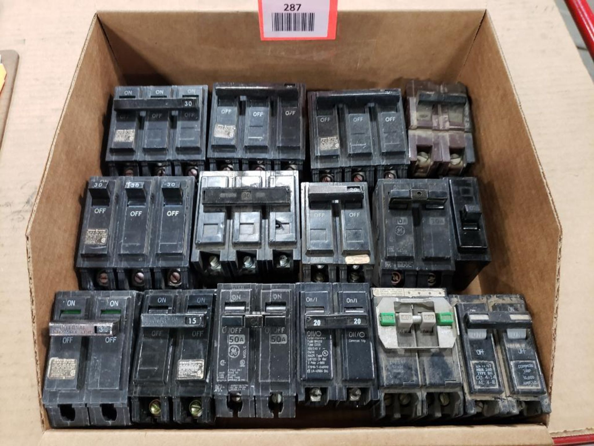 Assorted electrical circuit breakers. GE.