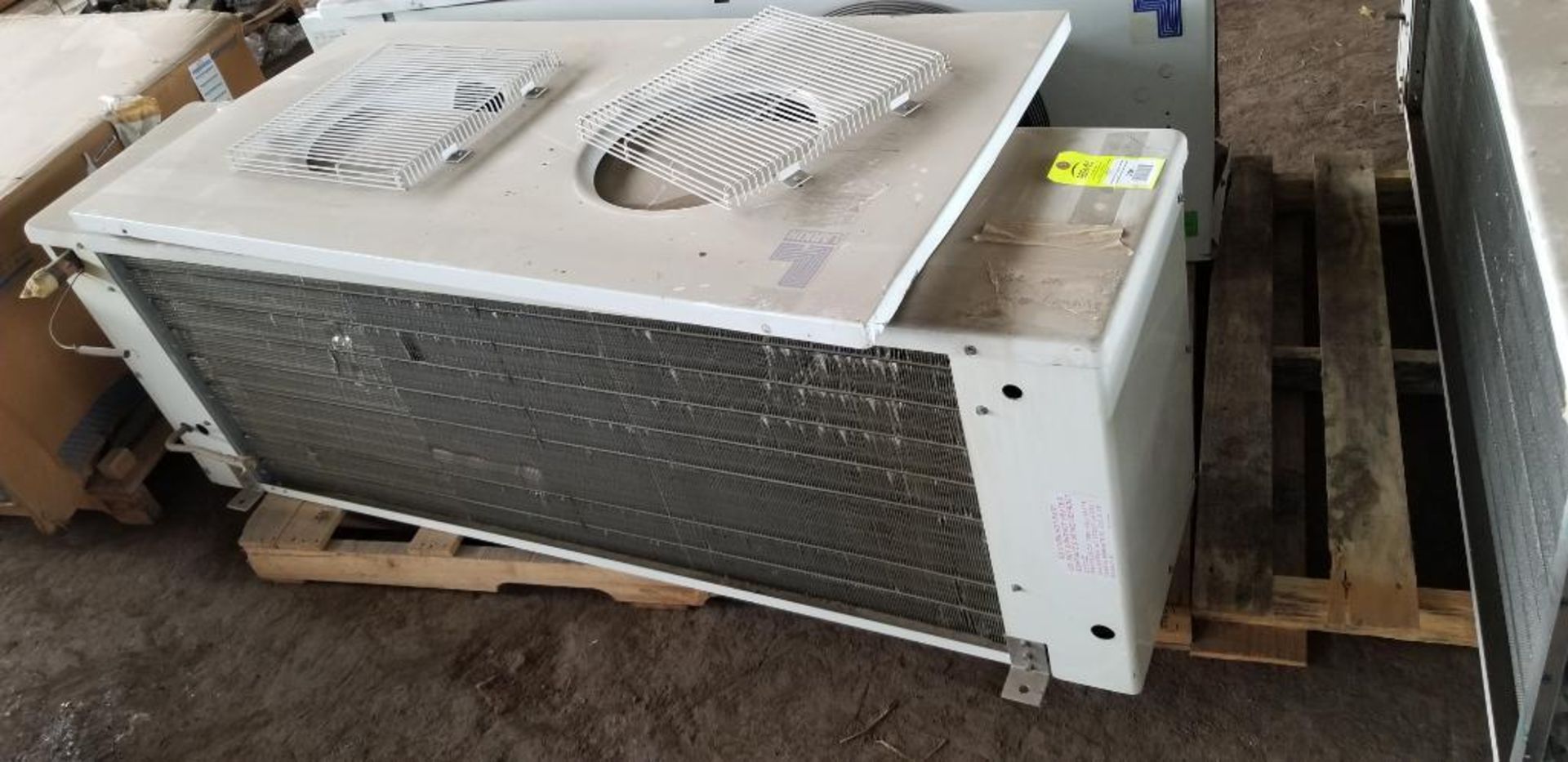 Heatcraft ACM090AEE center mount walk in cooler unit. 2 - 1/15HP, 115V, 1PH motors.