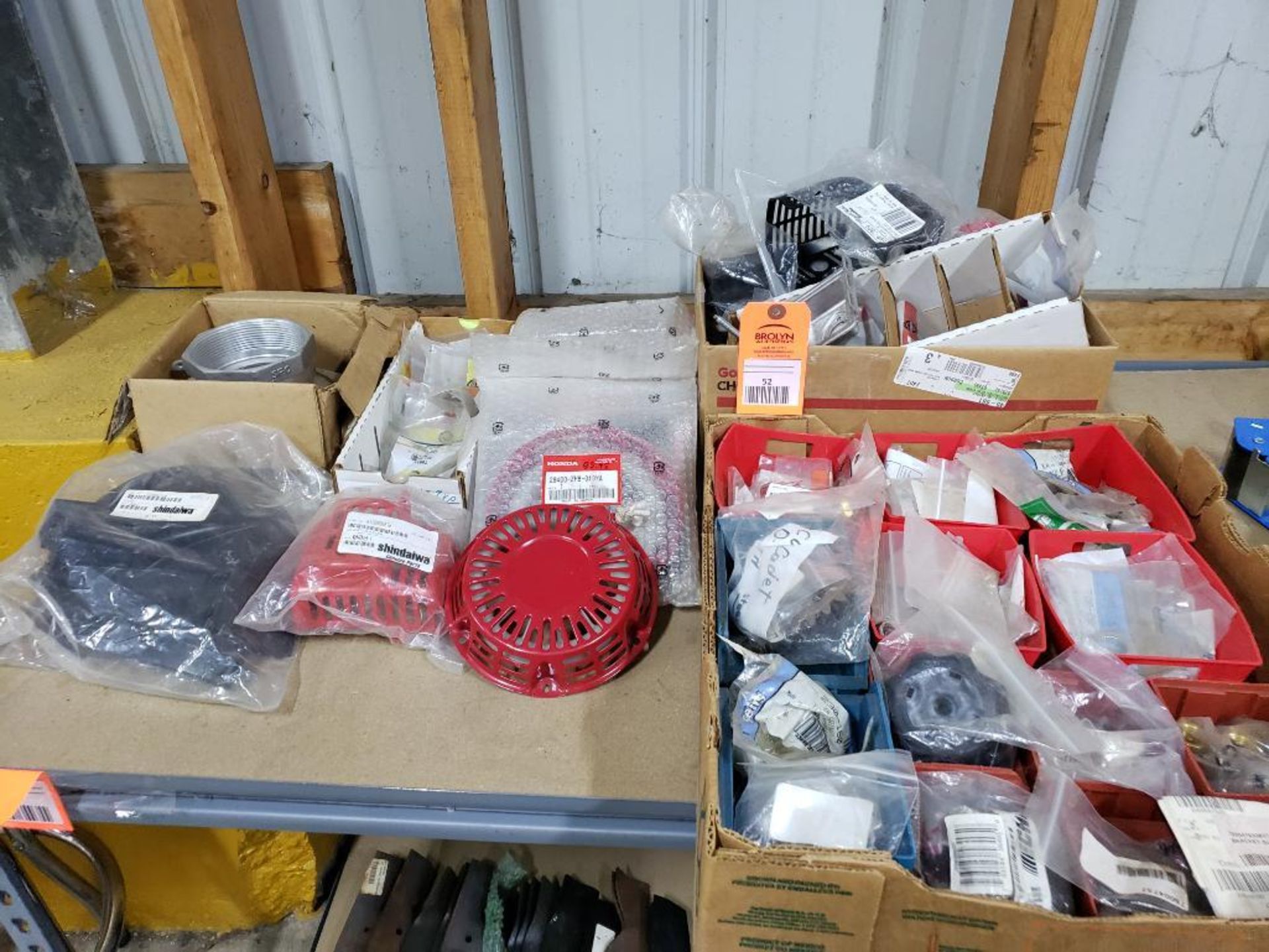 Large assortment of lawnmower and small engine repair parts. New as pictured.