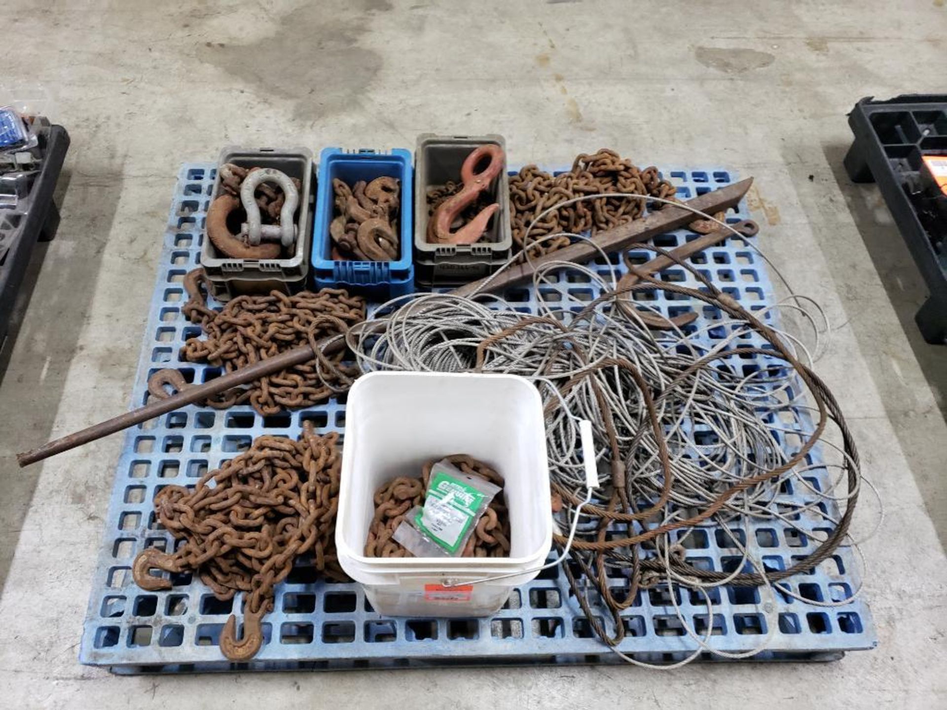 Pallet of assorted chains, bindings, etc.
